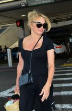 PAMELA ANDERSON Arrives at LAX Airport in Los Angeles 06/05/2019