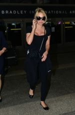 PAMELA ANDERSON Arrives at LAX Airport in Los Angeles 06/05/2019