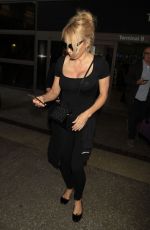 PAMELA ANDERSON at LAX Airport in Los Angeles 06/055/2019