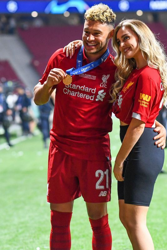 PERRIE EDWARDS and Alex Oxlade-Chamberlain at UEFA Champions League Final in Madrid 06/01/2019