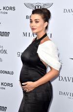 Pregnant AMY JACKSON at Cash & Rocket Masquerade Photocall in London 06/06/2019