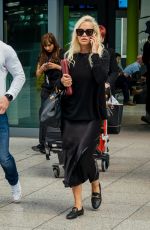 RITA ORA at Heathrow Airport in London 06/07/2019