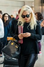 RITA ORA at Heathrow Airport in London 06/07/2019