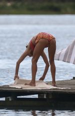 ALESSANDRA AMBROSIO in Bikini Doing Yoga on the Beach in Florianopolis 07/03/2019