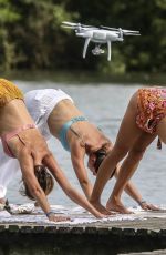 ALESSANDRA AMBROSIO in Bikini Doing Yoga on the Beach in Florianopolis 07/03/2019