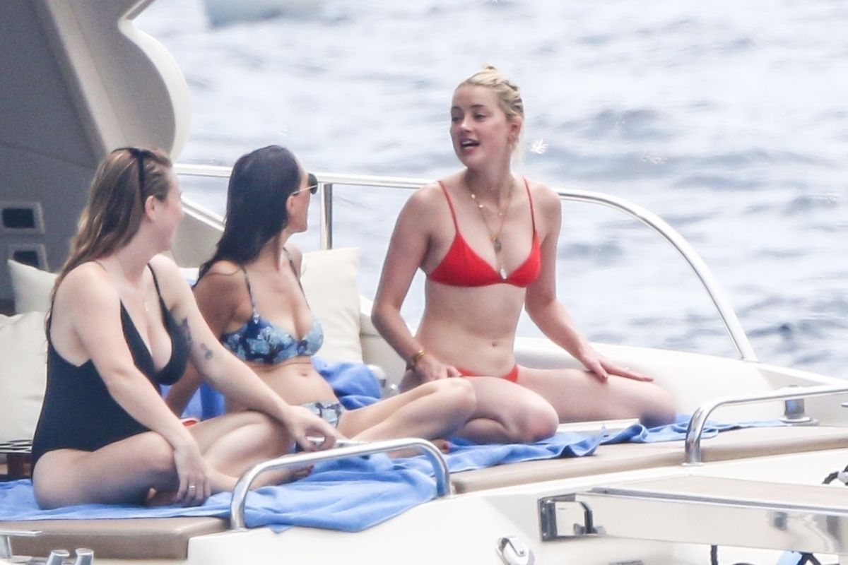 AMBER HEARD in Bikini at a Yacht on Amalfi Coast 07/27/2019.