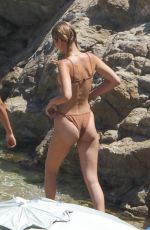 BELLA and GIGI HADID in Bikinis at a Beach on Mykonos Island 07/29/2019