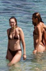 BELLA and GIGI HADID in Bikinis at a Beach on Mykonos Island 07/29/2019