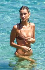 BELLA and GIGI HADID in Bikinis at a Beach on Mykonos Island 07/29/2019