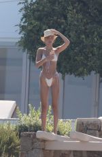 BELLA HADID in Bikini at a Pool on Mykonos Island 07/28/2019