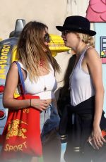 CARA DELEVINGNE and ASHLEY BENSON Out in St Tropez 07/05/2019