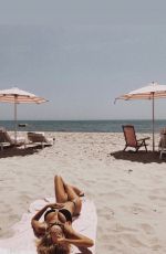 CHARLOTTE MCKINNEY in IG Bikini at a Beach 07/20/2019