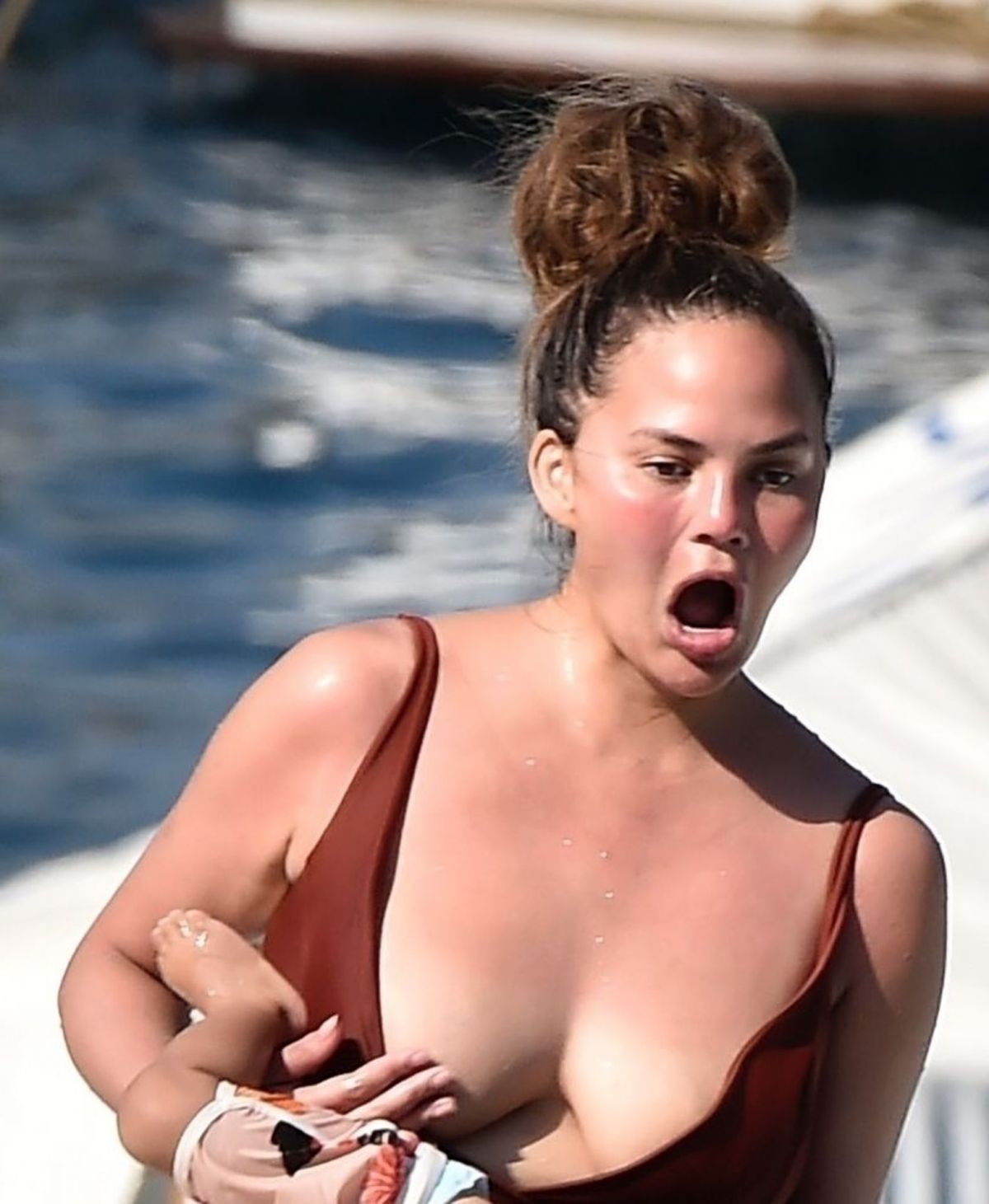 chrissy-teigen-in-swimsuit-at-a-boat-in-portofino-07-02-2019-10.jpg