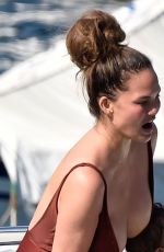 CHRISSY TEIGEN in Swimsuit at a Boat in Portofino 07/02/2019
