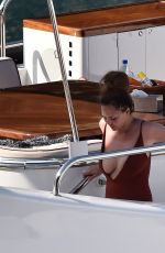 CHRISSY TEIGEN in Swimsuit at a Boat in Portofino 07/02/2019