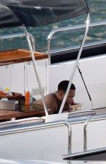CHRISSY TEIGEN in Swimsuit at a Boat in Portofino 07/02/2019