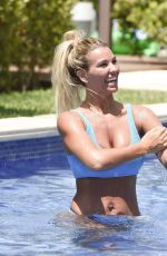 CHRISTINE MCGUINNESS in Bikini at a Pool in Spain 07/04/2019