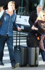 EMMA ROBERTS and Garrett Hedlund at Los Angeles International Airport 07/03/2019