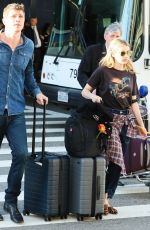EMMA ROBERTS and Garrett Hedlund at Los Angeles International Airport 07/03/2019