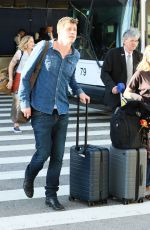 EMMA ROBERTS and Garrett Hedlund at Los Angeles International Airport 07/03/2019