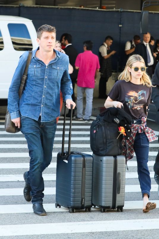 EMMA ROBERTS and Garrett Hedlund at Los Angeles International Airport 07/03/2019