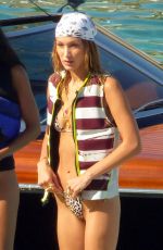 GIGI and BELLA HADID in Bikins at a Beach in Mykonos 07/30/2019