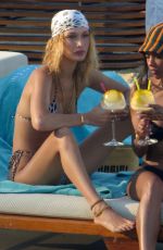 GIGI and BELLA HADID in Bikins at a Beach in Mykonos 07/30/2019