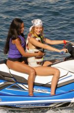 GIGI and BELLA HADID in Bikins at a Beach in Mykonos 07/30/2019