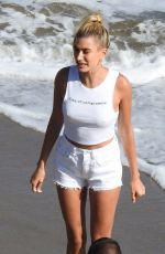 HAILEY BIEBER at a Photoshoot for Bare Minerals on the Beach in Malibu 07/23/2019