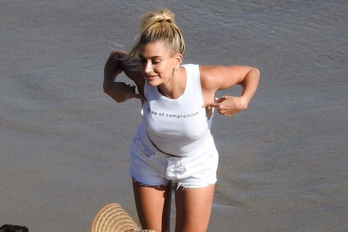HAILEY BIEBER at a Photoshoot for Bare Minerals on the Beach in Malibu 07/2...