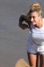 HAILEY BIEBER at a Photoshoot for Bare Minerals on the Beach in Malibu 07/23/2019