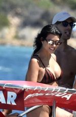 KOURTNEY KARDASHIAN in Bikini a Yacht in Sardinia 07/30/2019