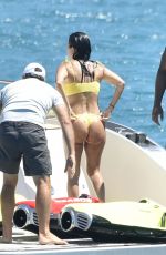 KOURTNEY KARDASHIAN in Yellow Bikini at a Yacht in Corsica 07/26/2019