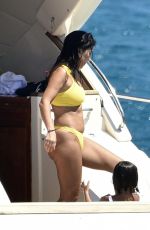 KOURTNEY KARDASHIAN in Yellow Bikini at a Yacht in Corsica 07/26/2019