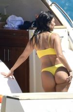 KOURTNEY KARDASHIAN in Yellow Bikini at a Yacht in Corsica 07/26/2019