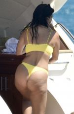 KOURTNEY KARDASHIAN in Yellow Bikini at a Yacht in Corsica 07/26/2019