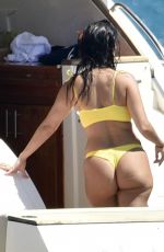 KOURTNEY KARDASHIAN in Yellow Bikini at a Yacht in Corsica 07/26/2019