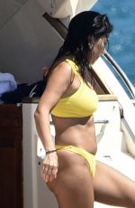 KOURTNEY KARDASHIAN in Yellow Bikini at a Yacht in Corsica 07/26/2019