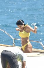 KOURTNEY KARDASHIAN in Yellow Bikini at a Yacht in Corsica 07/26/2019