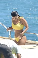 KOURTNEY KARDASHIAN in Yellow Bikini at a Yacht in Corsica 07/26/2019