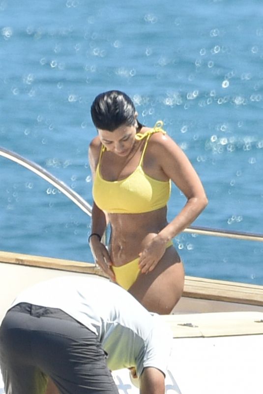 KOURTNEY KARDASHIAN in Yellow Bikini at a Yacht in Corsica 07/26/2019