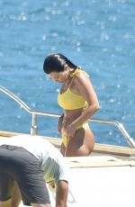 KOURTNEY KARDASHIAN in Yellow Bikini at a Yacht in Corsica 07/26/2019