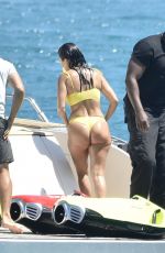 KOURTNEY KARDASHIAN in Yellow Bikini at a Yacht in Corsica 07/26/2019