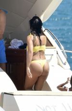 KOURTNEY KARDASHIAN in Yellow Bikini at a Yacht in Corsica 07/26/2019