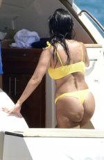 KOURTNEY KARDASHIAN in Yellow Bikini at a Yacht in Corsica 07/26/2019