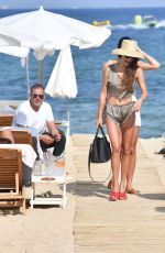 MAGGIE Q in Bikini at Loulou Beach Club in St. Tropez 07/17/2019