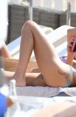 MAGGIE Q in Bikini at Loulou Beach Club in St. Tropez 07/17/2019