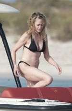 MELANIE GRIFFITH in Black Bikini on Vacaton in Ibiza 07/04/2019