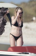 MELANIE GRIFFITH in Black Bikini on Vacaton in Ibiza 07/04/2019