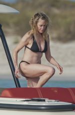 MELANIE GRIFFITH in Black Bikini on Vacaton in Ibiza 07/04/2019